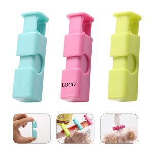 A reusable replacement for difficult-to-use bread tags and twist ties.