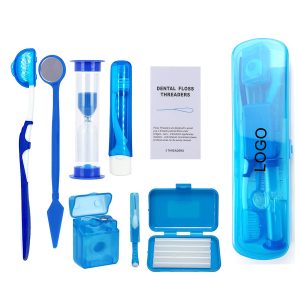 Indulge in a complete oral care experience with our essential kit, including a V-shaped toothbrush, a travel-sized regular toothbrush, a floss spool, an oral mirror, orthodontic wax, a gap brush, a 3-minute hourglass timer, and a floss threader.